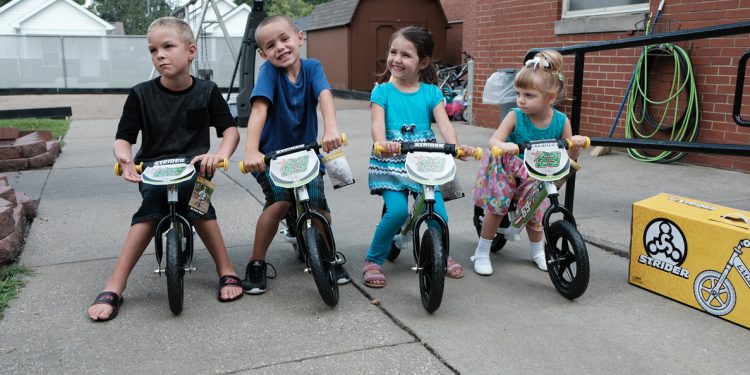 Hayden Family Donates Strider Bikes to Pitino Shelter