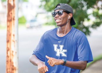 Tayvho dancing on the sidewalk