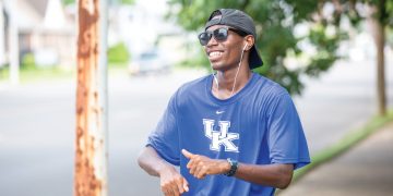 Tayvho dancing on the sidewalk