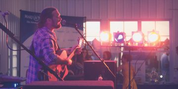 Andy Brasher playing music at Boilin at the Boro