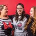 Eva Cash, Jessica Gillum, and Joy Beth Whitmer pose together wearing Minnie Mouse ears