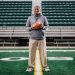 Kentucky Wesleyan College Head Football Coach Craig Yeast standing on football field