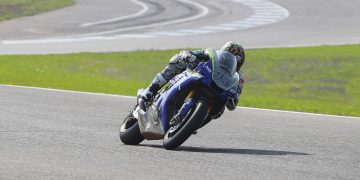 Motorcycle racer Jake Lewis on his bike