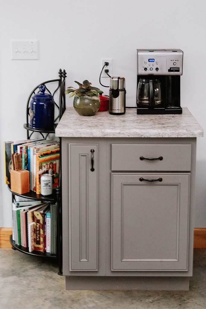 Recipe books and a coffee maker are essentials for the Hayden's kitchen.