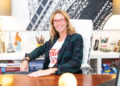 Dr. Suzanne Rashidian sitting at her desk